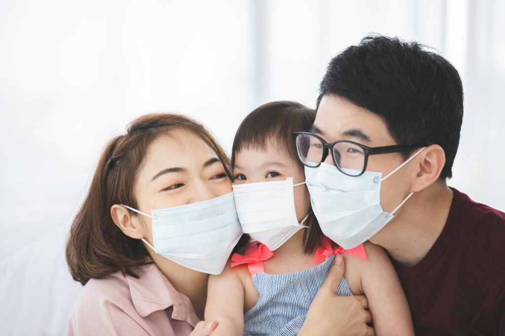 Asia Family in medical masks on the face